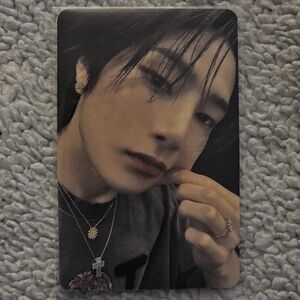 Photocard Featuring Woman Wearing Black Top and Gold Jewelry
